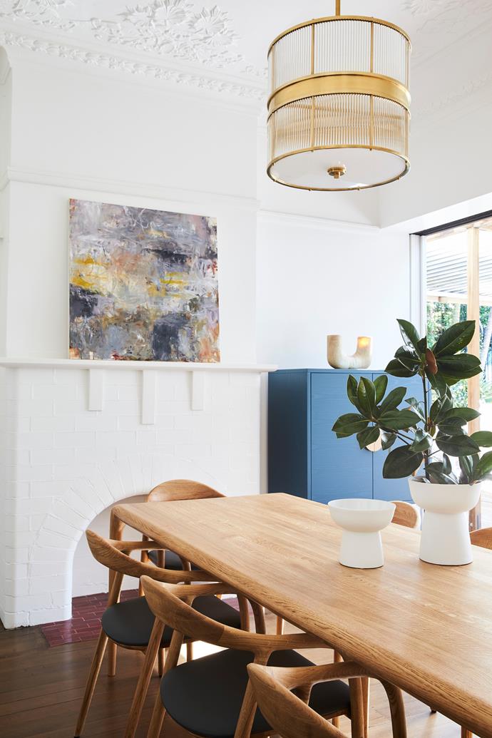 Lauren loves hosting dinner parties in the home's more formal dining area. "We emphasised blues and greens. I find cool colour palettes so relaxing," she says.