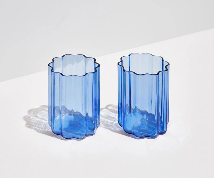 **[Fazeek wave glass in Blue, $71.10/set of 2 (usually $79), RJ Living](https://www.rjliving.com.au/wave-glass-set-of-2-blue|target="_blank"|rel="nofollow")**<br> 
With an eye-catching design (casting the most stunning shadows), these rippled glasses. They're also available in other colours including Pink and Maber, and also come as a Champagne coup. **[SHOP NOW](https://www.rjliving.com.au/wave-glass-set-of-2-blue|target="_blank"|rel="nofollow")**.