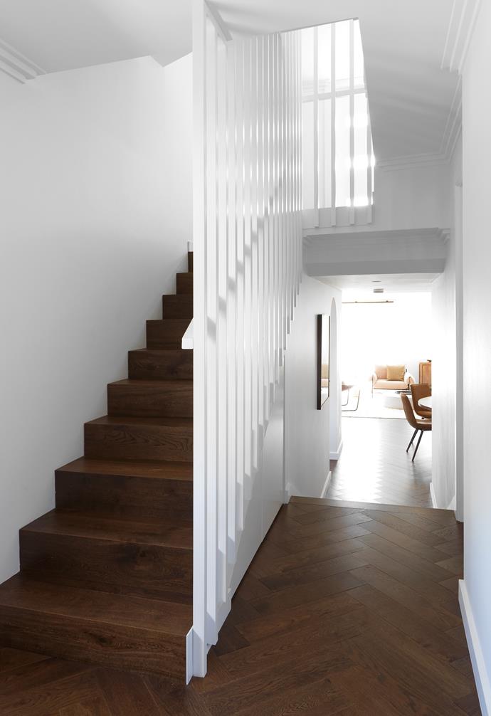 "This is what you see as you walk through the door," says Brooke of the stairway leading to a rooftop garden. Tiles and a metal balustrade were replaced with timber and battens.