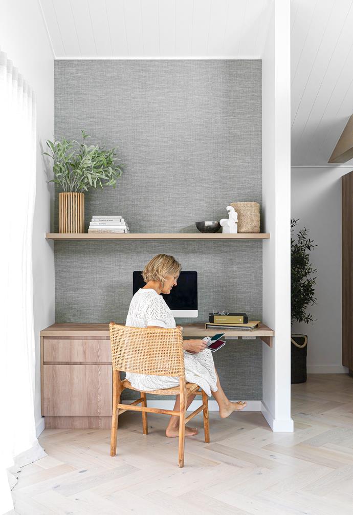 The study nook of this [coastal style home](https://www.homestolove.com.au/coastal-style-home-northern-beaches-23637|target="_blank") on Sydney's northern beaches is made a feature thanks to the textured, grasscloth-like 'Shinok' wallpaper. A set of drawers and built in shelf add up to just the right amount of storage, allowing owner Anna Williams, who is also an interior designer, display beautiful things while keeping clutter hidden.