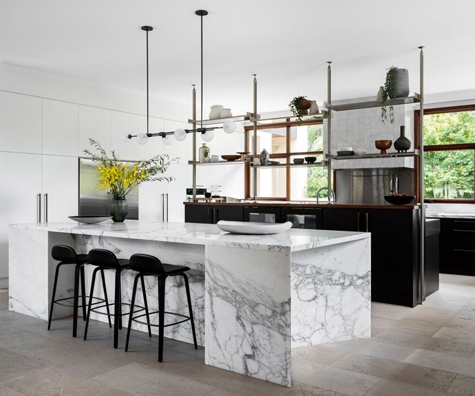 A Calacatta Oro marble island is a standout feature in the new kitchen.