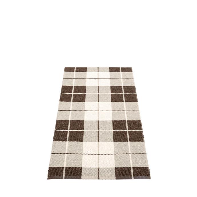 **[Pappelina Ed Rug in dark brown, $239.95, Nordic Fusion](https://www.nordicfusion.com.au/ed-rug-dark-brown-70x140|target="_blank"|rel="nofollow")**

"This rug ticks many boxes for me. Made in Sweden of PVC ribbons, it's super durable and machine washable - but looks like a wool rug. The plaid reminds me of the OG Charlotte York's Park Ave apartment, English hunting lodges and the homemade sofa cushion covers my mum made in the 70s. And I'm calling it: brown is back." - *Hanna Marton - Senior Content Producer*