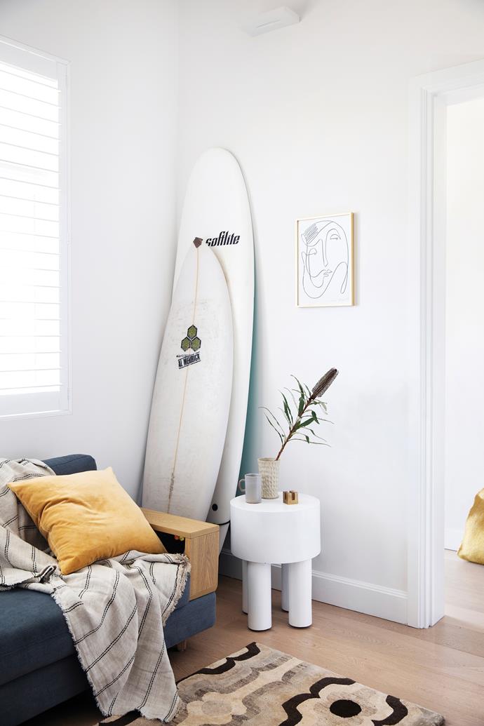 A couple of surfboards reinforce the relaxed mood in the kids' retreat. Sofa, [King Living](https://www.kingliving.com.au/|target="_blank"|rel="nofollow"). Side table, [Lumu Interiors](https://lumuinteriors.com/|target="_blank"|rel="nofollow"). Rug, [Cadrys](https://www.cadrys.com.au/|target="_blank"|rel="nofollow"). Saardé throw, [Commune Bondi](https://communebondi.com/|target="_blank"|rel="nofollow"). Walls, [Dulux](https://www.dulux.com.au/|target="_blank"|rel="nofollow") Casper White. Art by [Octavia Tomyn](https://www.octaviatomyn.com/|target="_blank"|rel="nofollow").