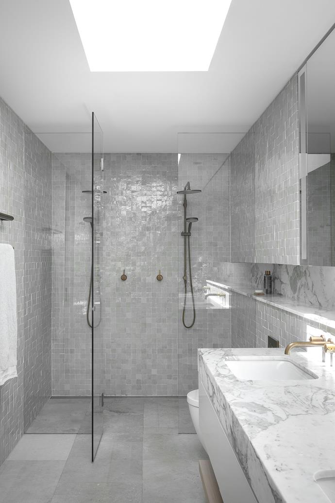City Stik basin tapware, City Plus shower set and heated towel rails, all Brodware. Custom-cut Moroccan mosaic
wall tiles, Barefoot Living.