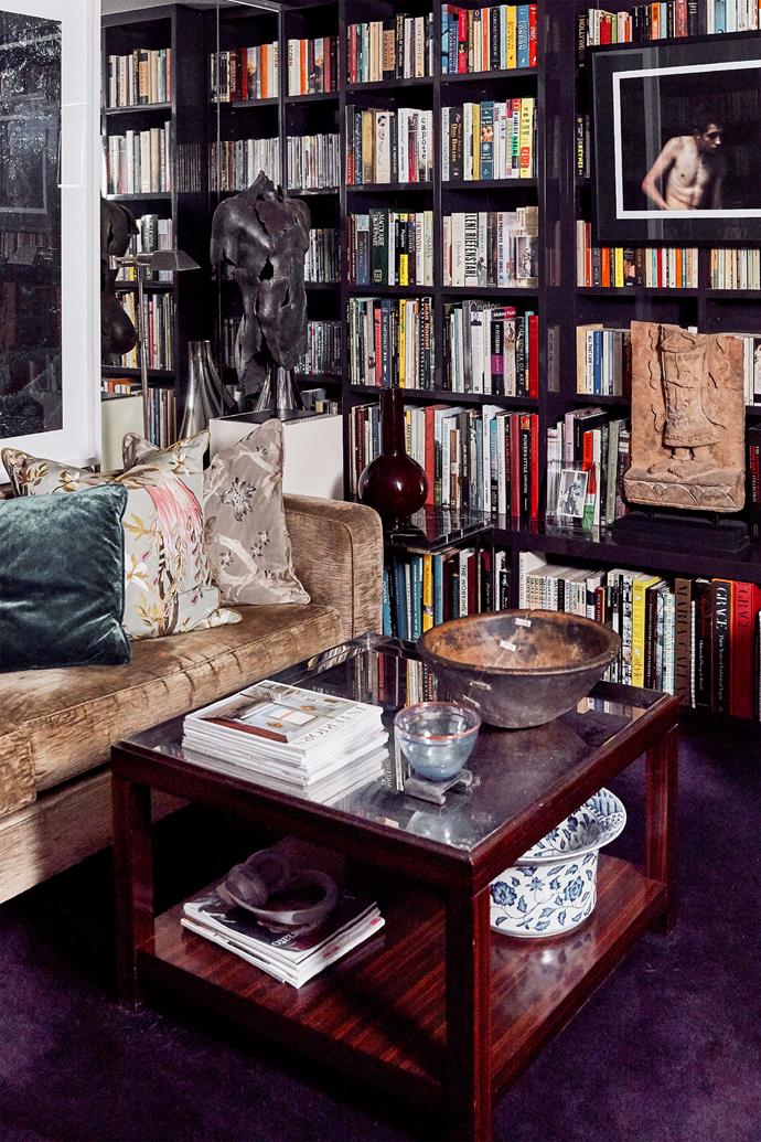 A Thonet 'Longreach' sofa from Anibou stars in the cosy library. Decca Home coffee table, Studio Cavit. Fragment of Hermes sculpture bought in Paris. Man Boy #1 artwork by Tamara Dean, Olsen Gallery.