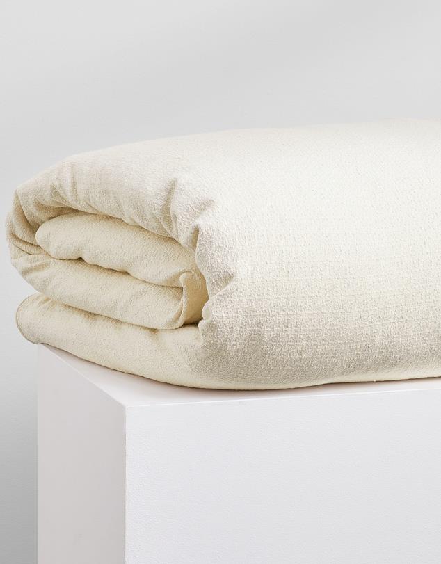 **[The Sheet Society Lola Bouclé queen quilt cover in Warm White, $161 (was $230), The Iconic](https://www.theiconic.com.au/lola-boucle-quilt-cover-set-1395997.html|target="_blank"|rel="nofollow")** 

[Bouclé homewares and furniture](https://www.homestolove.com.au/boucle-furniture-21234|target="_blank") has been the 'it' fabric of late, so why not introduce it to your bedroom. In an appropriately warm white colour, the quilt is made of 100% cotton, only more cosy and textural - having been 'curled' (which is the technique that makes it 'bouclé') - plus, it just gets softer with age!