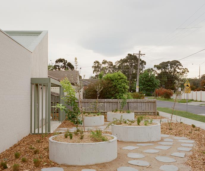 The front yard represents a communal space, allowing the residents to interact with one another and the community.