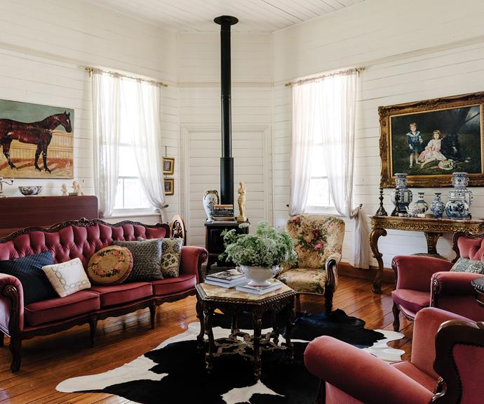 The living room's floors and walls are original. Sofas are from [The Old Boathouse](https://www.instagram.com/theoldboathouse_dock/|target="_blank"|rel="nofollow") and paintings are vintage.