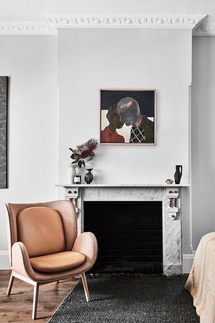 The fireplace is crowned with Carrara and Rosso Lepanto marble — a great match for the [Dulux](https://www.dulux.com.au/|target="_blank"|rel="nofollow") Rottnest Island wall colour throughout the house. Fogia 'Embrace' armchair, [Fred International](https://fredinternational.com.au/|target="_blank"|rel="nofollow"). On fireplace mantel: white ceramic vase, [The DEA Store](https://thedeastore.com/|target="_blank"|rel="nofollow"); Byredo scented candle, [Mecca](https://www.mecca.com.au/|target="_blank"|rel="nofollow"); black vase, [Katarina Wells](https://katarinawellsceramics.com/|target="_blank"|rel="nofollow"); brass box, [Dinosaur Designs](https://www.dinosaurdesigns.com.au/|target="_blank"|rel="nofollow"); Calliope stoneware by Ella Bendrups, [Saint Cloche](https://saintcloche.com/|target="_blank"|rel="nofollow"). Terra fine jute rug in Moss, [Armadillo](https://armadillo-co.com/|target="_blank"|rel="nofollow"). Artwork by Kerrie Oliver through [Curatorial+Co](https://curatorialandco.com/|target="_blank"|rel="nofollow").