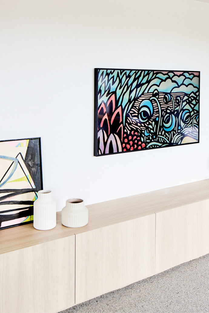 Wall-mounting a television is more challenging than you might think! Here, [Samsung's The Frame](https://www.samsung.com/au/tvs/the-frame/highlights/|target="_blank"|rel="nofollow") sits pretty amongst a collection of stunning artwork.