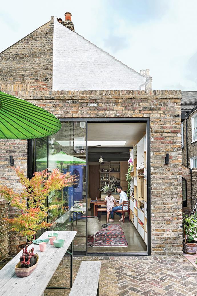 "I love that, although the property is pretty modern in its design, we've had a pop at creating our own history here." While most of the garden is paved in brick, a corridor of pink and terracotta tiles leads to an oriel window at the end of the side-return extension. "It's our little piece of Barcelona in Harlesden!" she says.