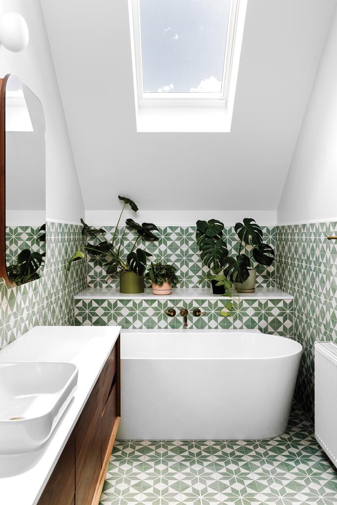 **ENSUITE** A [Velux](https://www.velux.com.au/|target="_blank"|rel="nofollow") skylight supplies this green-hued bathroom with plenty of natural light. Above the spotted-gum vanity by [Ingrain](https://www.ingraindesigns.com.au/|target="_blank"|rel="nofollow") hangs a custom mirror by [Brave New Eco](https://www.braveneweco.com.au/|target="_blank"|rel="nofollow"). Tiles, [Jatana Interiors](https://www.jatanainteriors.com.au/|target="_blank"|rel="nofollow"). Bath, [Clark](https://www.clark.com.au/|target="_blank"|rel="nofollow"). Basin, [Caroma](https://www.caroma.com.au/|target="_blank"|rel="nofollow"). Tapware, [Consolidated Brass Tapware](https://www.cbideal.com.au/|target="_blank"|rel="nofollow"). Wall light, [Vistosi](https://vistosi.com.au/|target="_blank"|rel="nofollow").