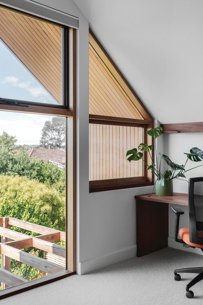 **OFFICE** Overlooking the backyard with a view to mountain ranges in the distance, the upstairs office sensibly includes a desk space large enough for two people.