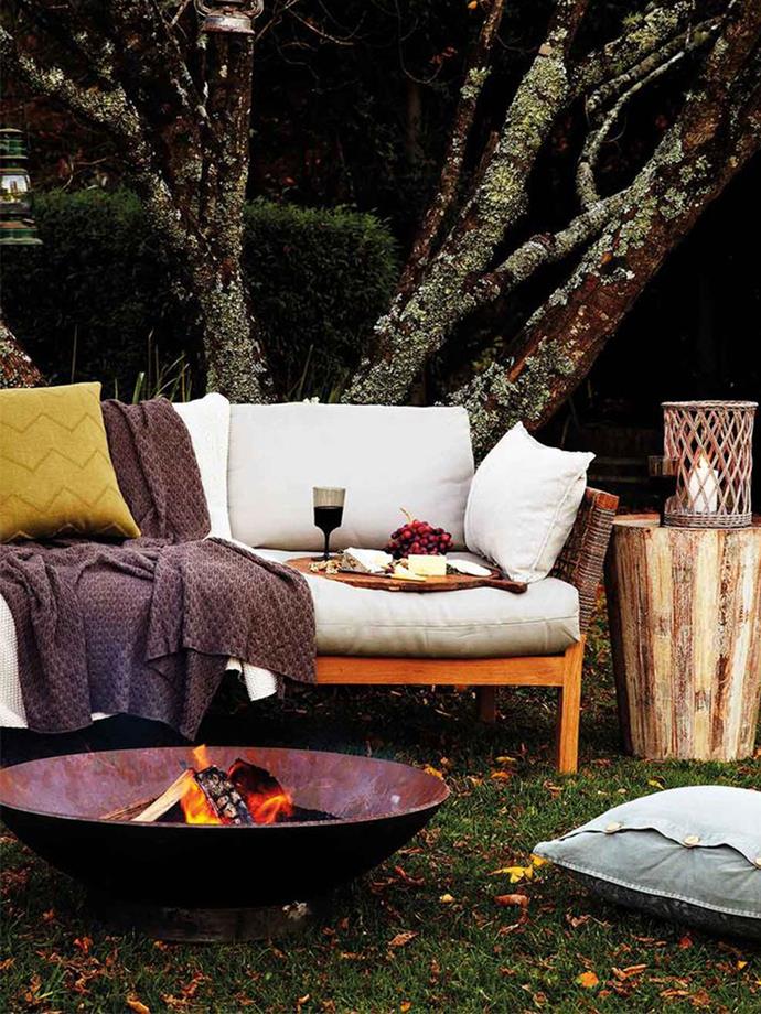 "Look for a style that will nestle nicely into your garden landscape and that will age beautifully - something that will patina nicely," says landscape designer Adam Robinson. Create a beautiful ambience in your outdoor area by adding soft furnishing, outdoor lighting and candles.
