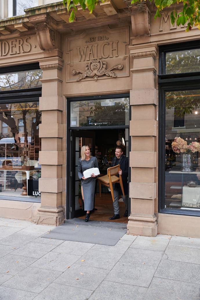 Jean-Pierre and Elise exit Luc Design store, housed in the 1836 Walch building in Hobart's Macquarie Street.