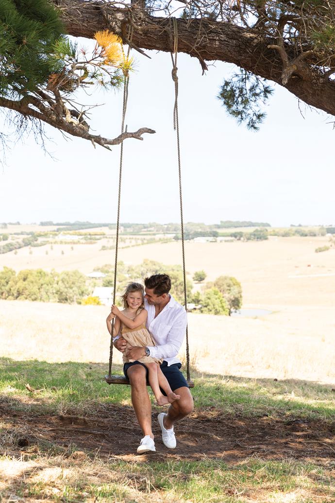 Arabella and Tom share the swing.