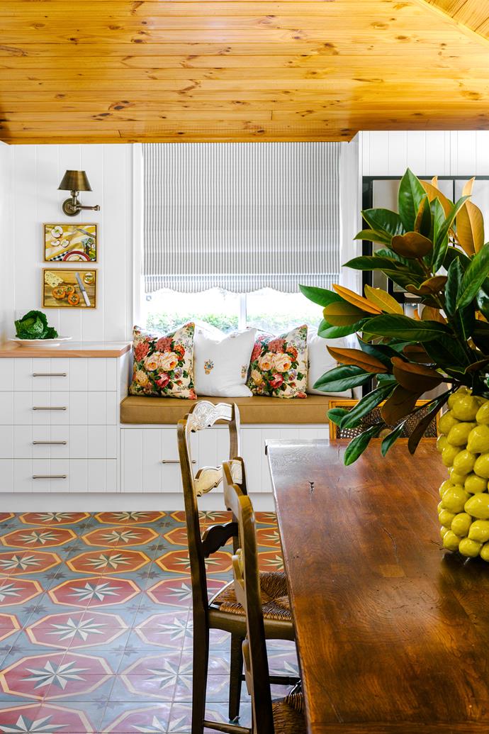 **KITCHEN** Interior designers [Ivy + Piper](https://www.ivyandpiper.com.au/|target="_blank"|rel="nofollow") started from scratch in the kitchen. "We wanted to infuse it with a more traditional country feel by using a patterned encaustic floor tile from [Jatana Interiors](https://www.jatanainteriors.com.au/|target="_blank"|rel="nofollow") and antiques, along with soft furnishings," says interior designer Melanie Parker. Some cabinetry was retained and the layout changed for functionality. The window seat is in '[Lustrell Deluxe' vinyl in Manuka from Warwick](https://www.warwick.com.au/products/lustrell-deluxe/manuka/|target="_blank"|rel="nofollow"). "With three boys on a farm, this is a hard-working house that looks great but is also durable," says Sally. "This vinyl seat can be wiped clean." The custom cushions are in Robert Allen fabric (try Redelman Fabrics) and the blind in Warwick 'Calverton' ticking in Evergreen. Above, the pine ceiling was added when the house was moved to its current site from Toowoomba. "We were going to paint it white but decided it gives the kitchen a country feel," says Sally.