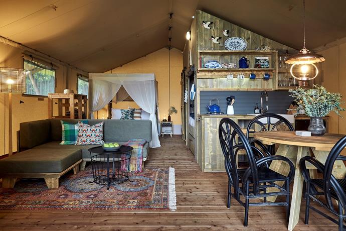 Reclaimed timber and upcycled decor give the glamping tents at Myall River Camp a rustic,  Australian bush aesthetic.