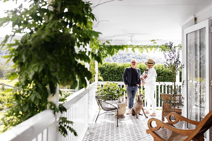 Neale and David with two of their beloved dogs, Graham the Italian Greyhound (in David's arms) and Thibault the Weimaraner, and that amazing backdrop of rolling green countryside. The exterior is painted Dulux Tranquil Retreat and Dulux Vivid White. The climber trailing over the verandah is white wisteria. Templar Herald Charcoal tiles, Beaumont Tiles. Haiku fans, Big Ass Fans.