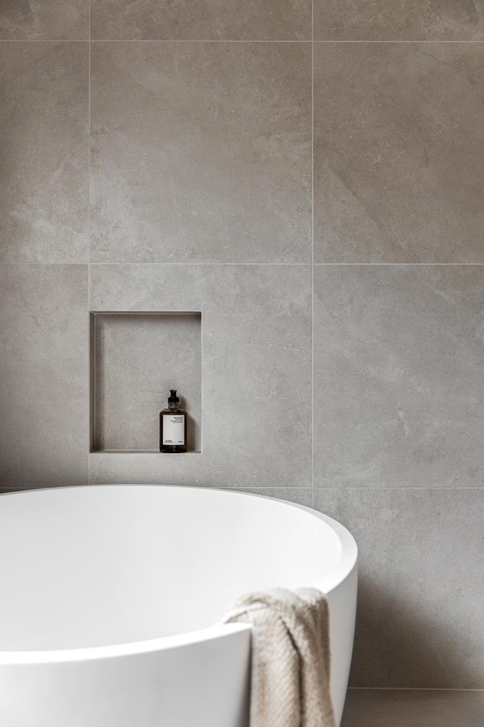 Kate designed a new scheme based on natural materials and clean lines. Vizzini 'Balla Stone' freestanding limestone-composite bath, [Renovation Kingdom](https://www.renovationkingdom.com.au/|target="_blank"|rel="nofollow").
