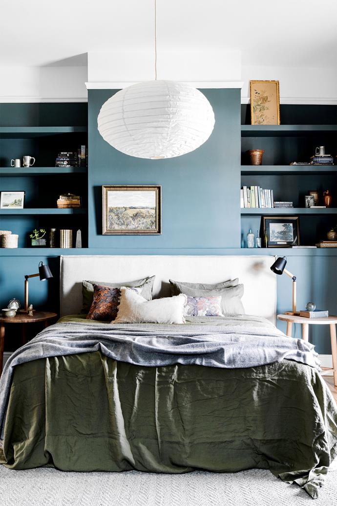 Walls painted in Porter's Paints 'Prussian Green' ensure a dramatic main bedroom, with contrast provided by a custom linen bedhead from The Upholstery House and a pendant light from The Society Inc. Bedside tables and lamps, Provincial Home Living. Bedlinen, [Cultiver](https://cultiver.com.au/collections/forest|target="_blank"|rel="nofollow"). A mix of custom cushions and cushions from Macey & Moore. Grey throw, Shaynna Blaze.