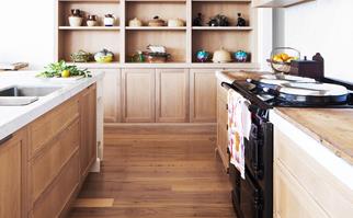 Timber kitchen cabinetry with customer timber shelving and oven