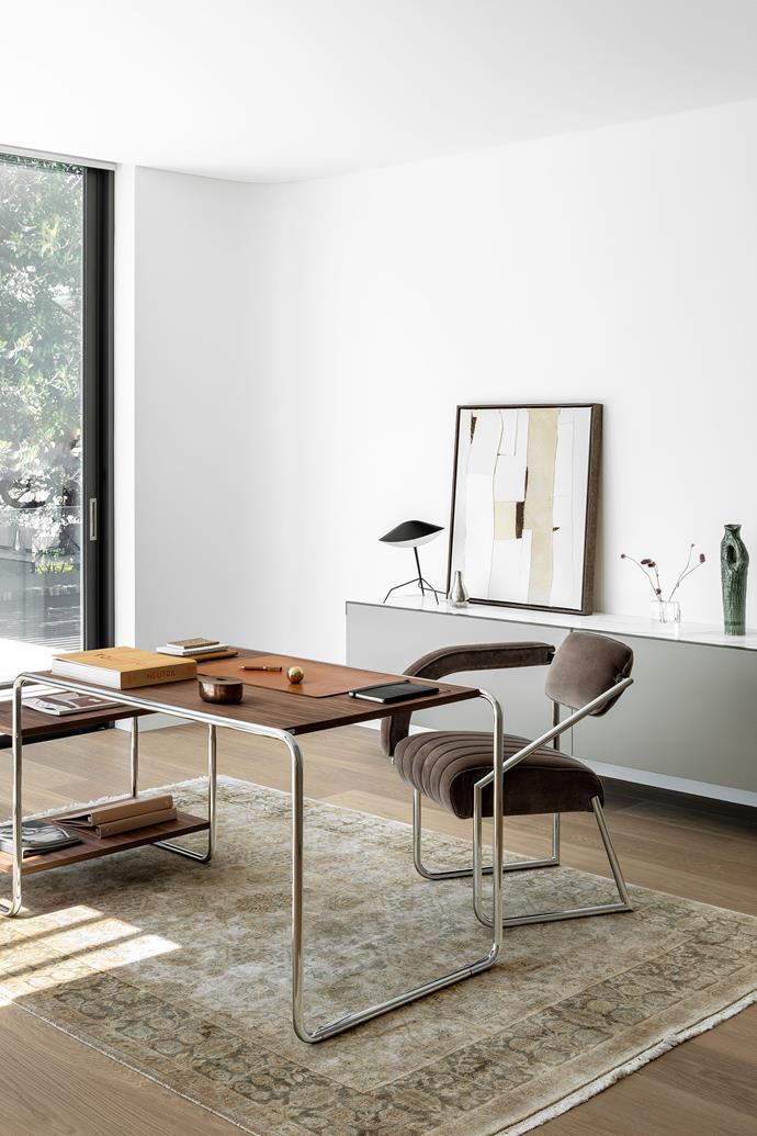 In the study, a Thonet 'S 285' desk by Marcel Breuer and [ClassiCon 'Non Conformist' chair](https://www.1stdibs.com/furniture/seating/office-chairs-desk-chairs/classicon-non-conformist-chair-leather-eileen-gray/id-f_13851431/|target="_blank"|rel="nofollow") by Eileen Gray, both from Anibou, sit on a handspun pure silk Jaipuri rug from Cadrys. Serge Mouille table lamp from Cult. *What to Remember When Waking* artwork by Morgan Stokes and 'Onishi #21.040' vase by Kerryn Levy, both from Curatorial+Co.