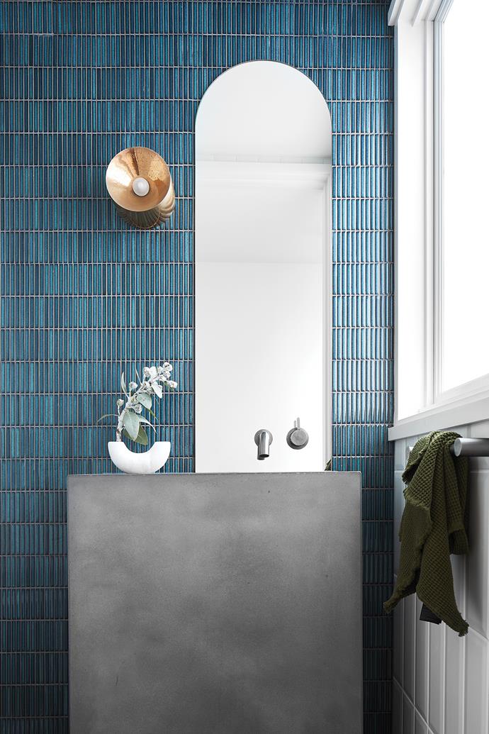 **POWDER ROOM** Guests must clamour to visit this space. Stix mosaic tiles, [Surface Gallery](https://surfacegallery.com.au/|target="_blank"|rel="nofollow"). Mirror, custom. Gunmetal taps, [Sussex Taps](https://sussextaps.com.au/|target="_blank"|rel="nofollow"). Light, [Volker Haug](https://www.volkerhaug.com/|target="_blank"|rel="nofollow"). Vase, [Dinosaur Designs](https://www.dinosaurdesigns.com.au/|target="_blank"|rel="nofollow").