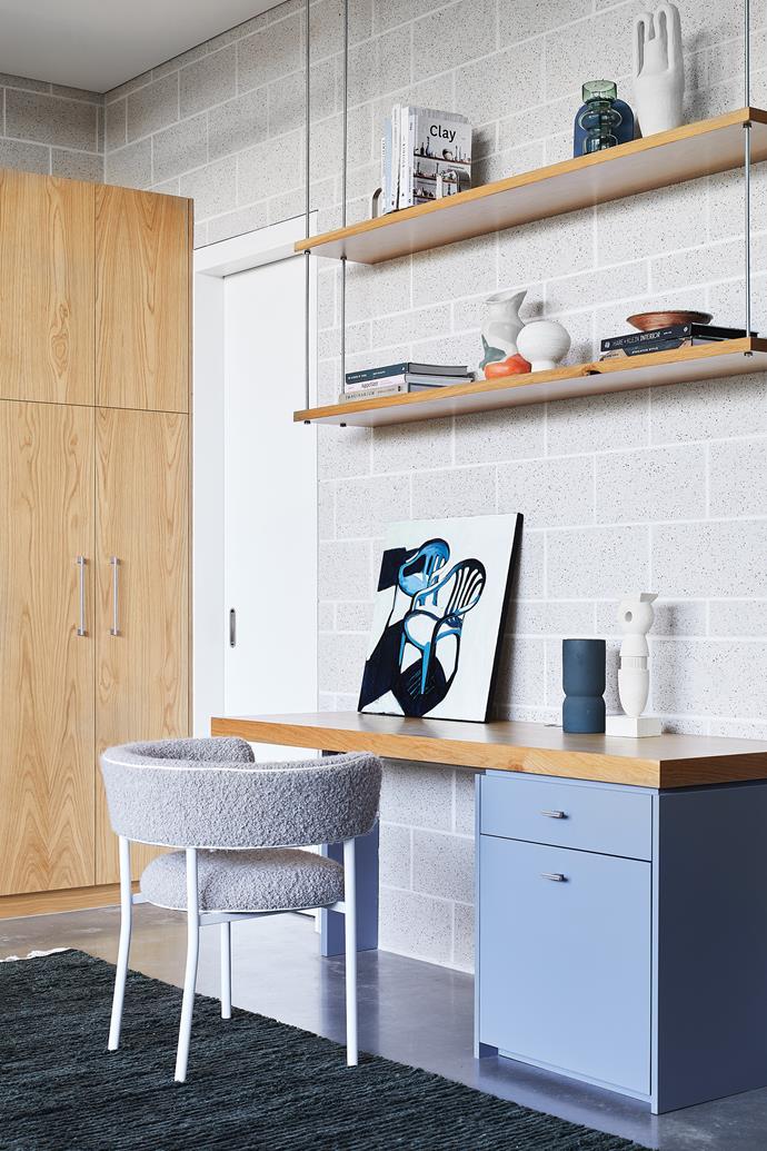 **STUDY AREA** Hard-wearing materials are the heroes of the combined ground-floor study and rumpus. The custom desk and shelving sit in the middle of the room, with a grey chair from [Space](https://www.spacefurniture.com.au/|target="_blank"|rel="nofollow") vibing with the GB Masonry blocks in Porcelain by [Austral](https://australbricks.com.au/|target="_blank"|rel="nofollow"). The polished concrete flooring was a practical choice for the backyard level. Artwork by Maria Kostareva, through [Curatorial+Co](https://curatorialandco.com/|target="_blank"|rel="nofollow").