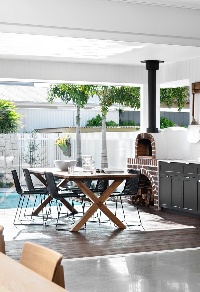Sarah and Jared's alfresco eating area is accessed from their open-plan living space. The wood- fired oven echoes the shape and colour of the indoor fireplace and archway. Brick oven, [Pizza Ovens R Us](https://pizzaovensrus.com.au/|target="_blank"|rel="nofollow"). Barbecue, [BeefEater](https://www.beefeaterbbq.com/en-au/|target="_blank"|rel="nofollow"). Outdoor dining table, [The Beach Furniture](https://thebeachfurniture.com.au/|target="_blank"|rel="nofollow"). Chairs, [Kira & Kira](https://kiraandkira.com.au/|target="_blank"|rel="nofollow"). Pizza tools, [Slow Food & Hand Forged Tools](http://www.slowfoodandhandforgedtools.com.au/|target="_blank"|rel="nofollow").
