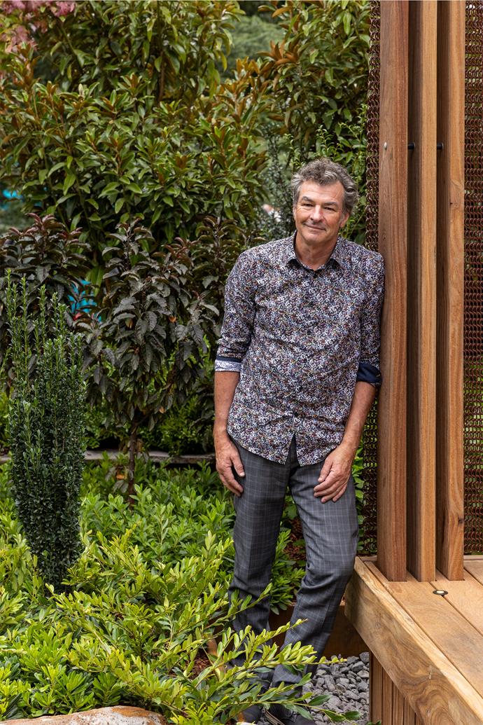 Landscape designer Mark Browning paid homage to his "mad keen" gardener mother, Audrey, by featuring newly released and never-before seen plants – including Distylium' Vintage Jade' at his feet and, behind him, [a new crabapple](https://www.homestolove.com.au/spring-crabapples-9908|target="_blank"), Malus' Strawberry Pear', both from Fleming's Nurseries.