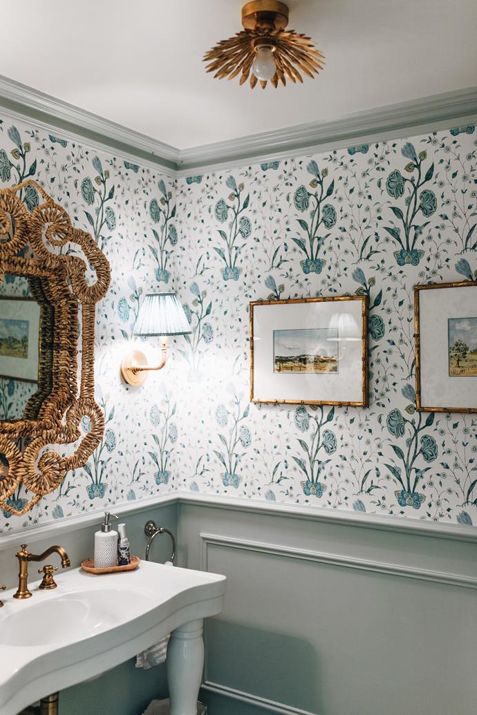 **POWDER ROOM** The powder room was refreshed with Schumacher 'Khilana Floral' wallpaper, paired with [Dulux Roland](https://www.homestolove.com.au/modern-country-farmhouse-brisbane-23394|target="_blank") on the wainscotting. For a personal touch, the framed watercolours were painted by Melinda's father.