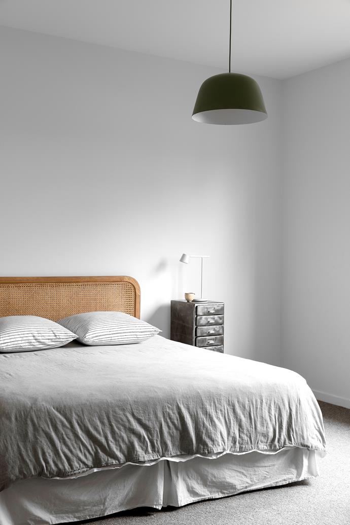 The main bedroom is a clutter-free zone with just an [Inartisan](https://www.inartisan.com/|target="_blank"|rel="nofollow") bedhead, vintage side table Living Edge lamp and [Muuto pendant](https://livingedge.com.au/brands/muuto/|target="_blank"|rel="nofollow") in place.
