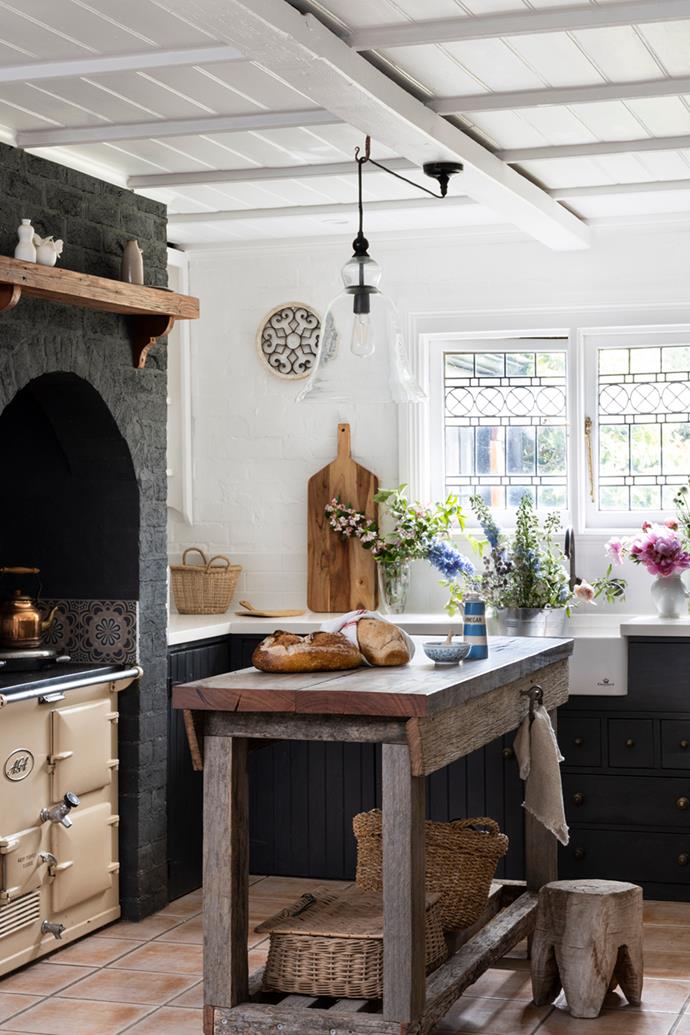 **KITCHEN** 'We've tried to stay sympathetic to the history of the cottage while making it more comfortable and liveable," says Amanda. The Aga surround and cabinets were repainted [Mezzie + Frank](https://www.mezzieandfrank.com.au/|target="_blank"|rel="nofollow") Coalmine and an undermount [Chambord](https://www.spirit-of-chambord.com/|target="_blank"|rel="nofollow") sink was set into the new Quantum Quartz 'Luna White' benchtop with appliances underneath.