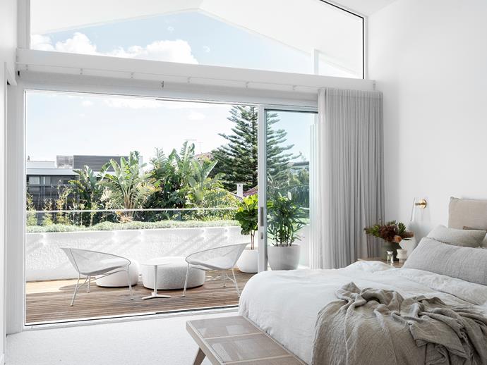 Galleria bench, MCM House. [Bedlinen, Cultiver](https://cultiver.com.au/products/linen-duvet-cover-set-white|target="_blank"|rel="nofollow"). Domi wall sconce, Articolo Lighting. Curtains, Debonair Curtains & Blinds. Throw, Eadie Lifestyle. Luna outdoor chairs and Crescent outdoor ottomans, King. Outdoor pots, The Balcony Garden.