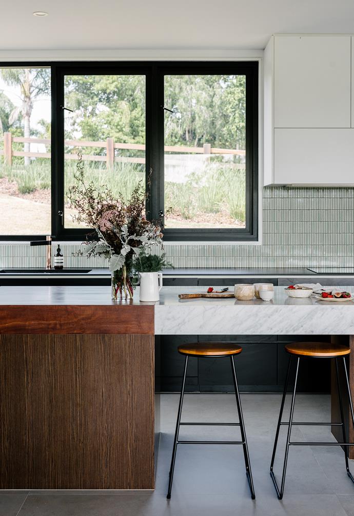 The kitchen was designed to offer harmonious views of the surrounding paddocks.