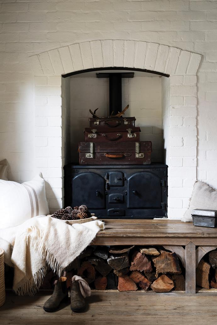 A cosy nook and the living area beyond combines vintage finds with contemporary luxury.