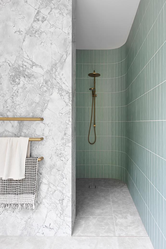 Handmade Moroccan wall tiles in Mint from Surface Gallery clad the shower walls. 'Garonne' limestone tiles from Eco Outdoor.