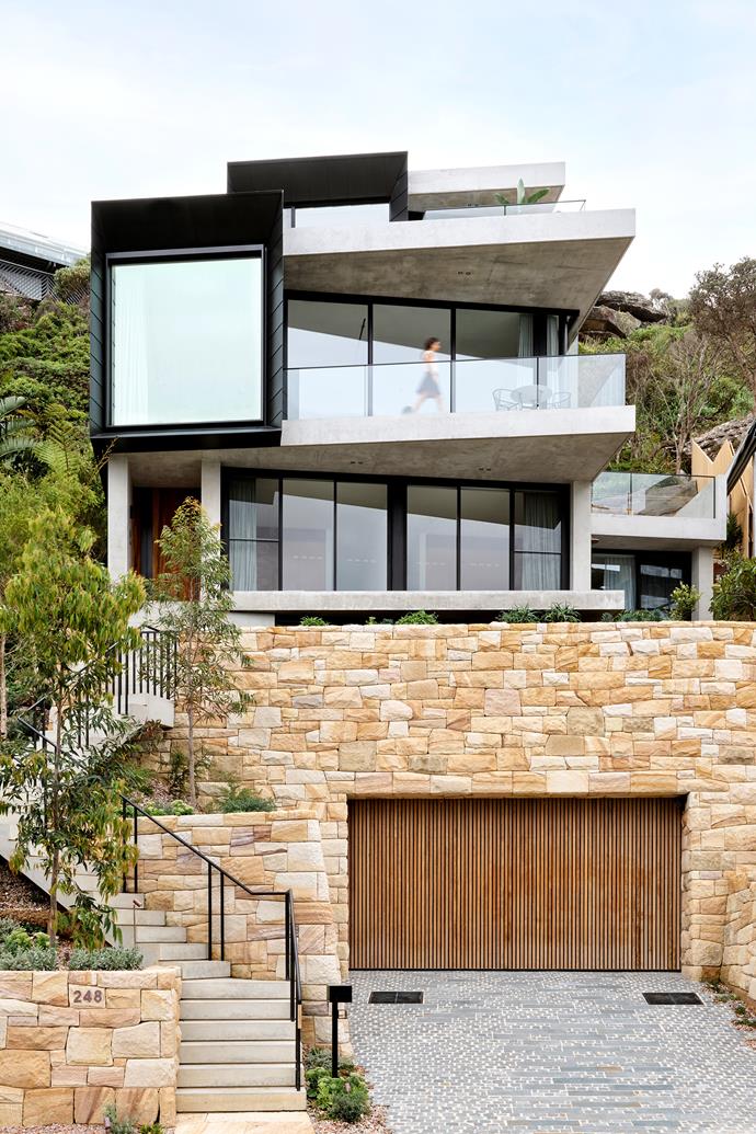 Conrad Johnston has played with geometry to brilliant effect on the facade with the huge picture window to the left and balconies orientated at intriguing angles. ProGlide 'UltraFlat' commercial windows from Central Coast Shopfronts. Walls in sandstone from Gosford Quarries and salvaged sandstone from the site by Drew Brown Landscapes & Stone. Cobblestone pavers on drive from Eco Outdoor.