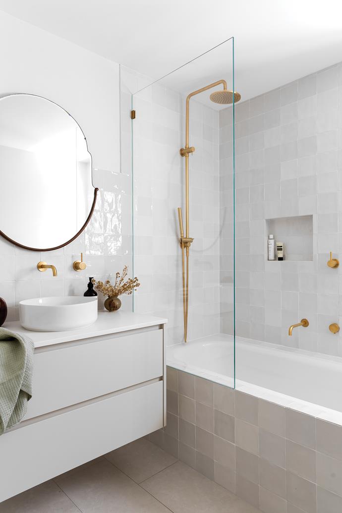 **BATHROOM** The tapware and shower in Urban Brass are from [Astra Walker](https://www.astrawalker.com.au/|target="_blank"|rel="nofollow"). "Brass finishes throughout the house really complement the earthy, neutral tones," says Heidi. Ceramic gloss tiles, [Surface Gallery](https://surfacegallery.com.au/|target="_blank"|rel="nofollow"). Allure basin, [Timberline](https://timberlinebp.com.au/|target="_blank"|rel="nofollow"). [Caesarstone](https://www.caesarstone.com.au/|target="_blank"|rel="nofollow") benchtop in Palm Shade.