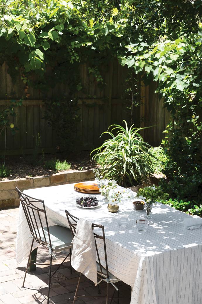 **GARDEN** This is a blissful area to spend time in. Metal outdoor chairs, antique.