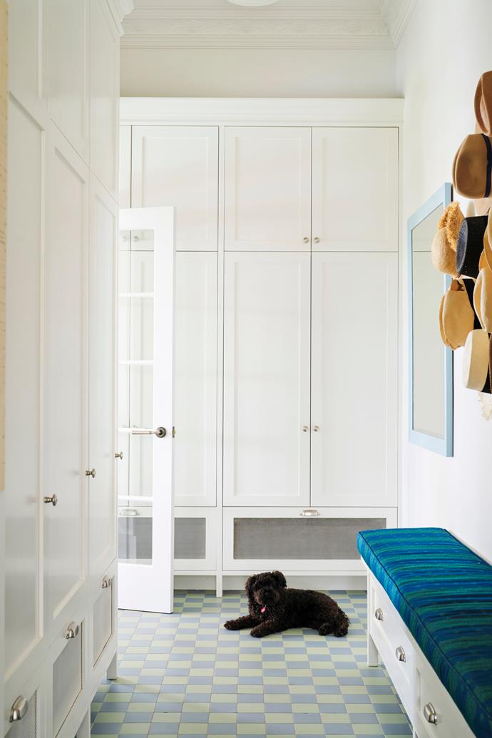 **LAUNDRY & MUDROOM** Pickles the Mini Schnauzer stays cool on the Winckelmans tessellated floor tiles from Olde English Tiles in the [mudroom](https://www.homestolove.com.au/mudroom-design-6620|target="_blank").