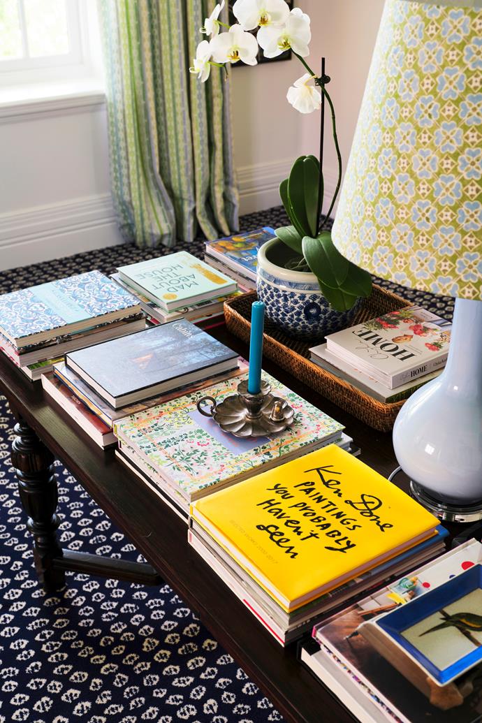 A collection of art and interior design books on display in the music room.