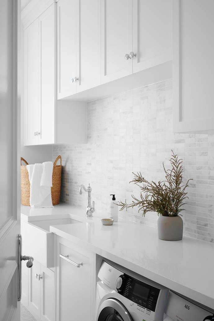 **LAUNDRY** While the laundry is a room for chores, it still evokes a sense of calm, due in part to the abundance of natural light and the white finishes. The splashback is Carrara marble from [Italia Ceramics](https://italiaceramics.com.au/|target="_blank"|rel="nofollow").