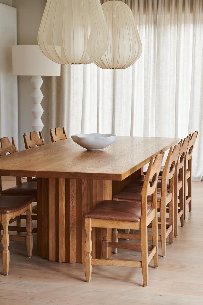 The dining room chairs were sourced from overseas, then reupholstered. The solid-timber table is by [Arranmore Furniture](https://arranmorefurniture.com.au/|target="_blank"|rel="nofollow").