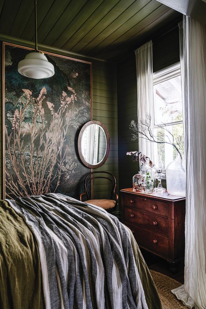 In this [restored heritage cottage in country Victoria](https://www.homestolove.com.au/restored-heritage-cottage-dry-diggings-vic-23981|target="_blank"), shades of green echo romance and history, while a  a special collection of domes, vases and lamps in the bedroom evoke the otherworldly nature of the property.