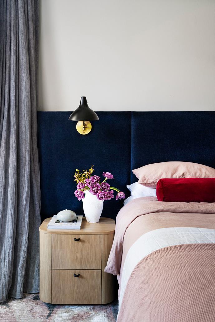 Light peachy terracotta tone linen provides a welcome lift and contrast to the deep velvet bedhead in this [immaculately styled Sydney home](https://www.homestolove.com.au/harbourside-sydney-home-cloth-stone-designs-24404|target="_blank").