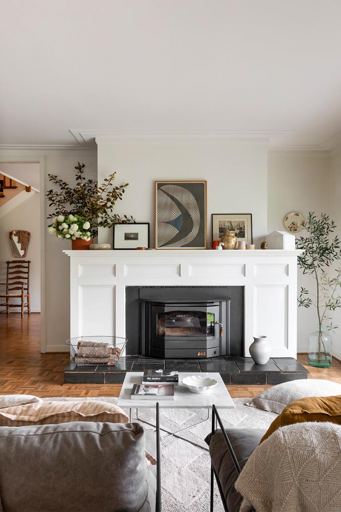 In the stately living room of this country-style Gembrook home, a grand fireplace takes centre stage. "The home has a lot of American design influence," says Bobby Gordon, director and general manager of Robert Gordon, who owns this property alongside his wife and children. "It was quite unique for the area."
