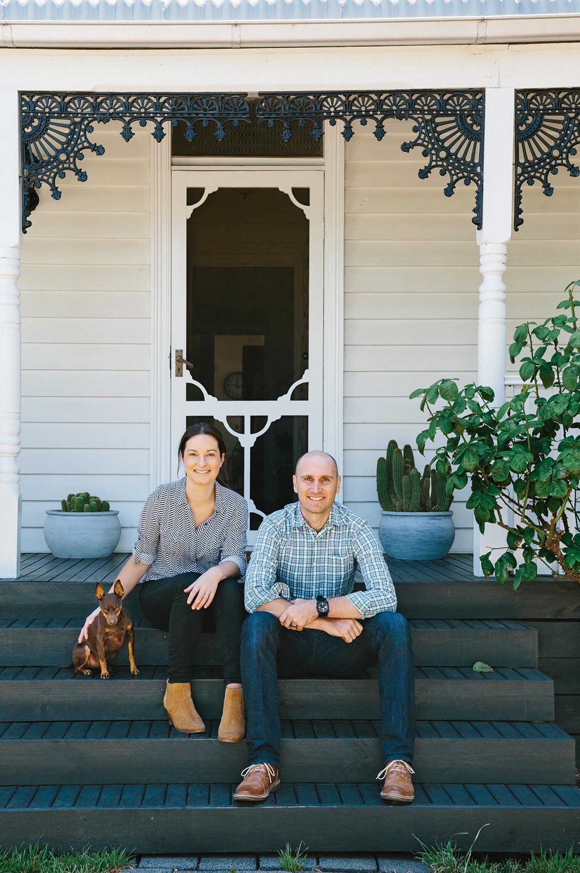 For photographer Marnie Hawson and her husband Ryan (and their miniature pinscher, Dexter), moving into a [weatherboard cottage in the Macedon Ranges](https://www.homestolove.com.au/treechange-trading-city-life-for-a-cottage-in-the-mountains-13773|target="_blank") was less of a 'tree-change' and more of a 'tree homecoming.' After so many years spent travelling while based in Melbourne, they began to yearn for a home to nest in. What better place to look than regional Victoria where they both grew up? Now they live in a beautifully styled home filled with vintage, recycled and sentimental furniture. *Photo: Marnie Hawson*