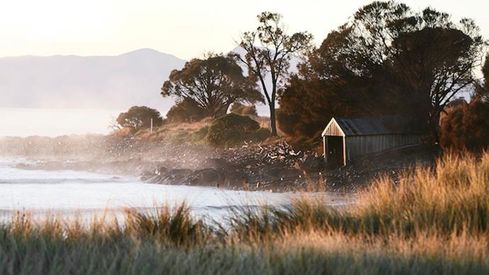 The morning fog lifting along the Freycinet Coast at Piermont. *Photo: Sharyn Cairns*